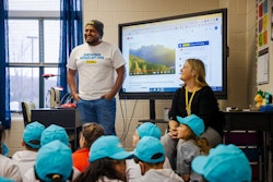 Truck driver speaks to third grade class
