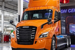 Orange battery-electric Freightliner eCascadia