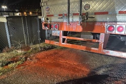 Red dye on back of trailer and highway