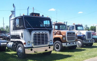 Three vintage semi trucks
