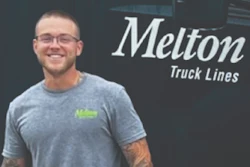 Truck driver with his truck