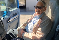 Ralph Hardy seated in a truck