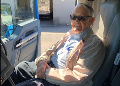 Ralph Hardy seated in a truck