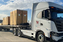 Battery electric Nikola Class 8 tractor with loaded flatbed trailer