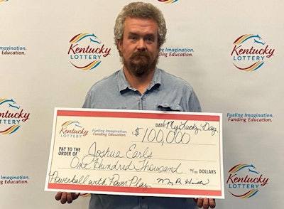 Man with large check