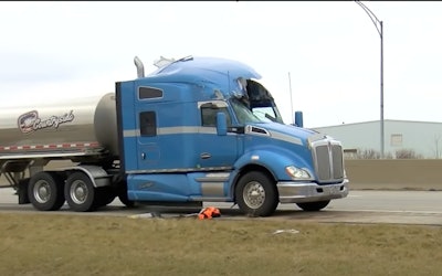 Damaged tractor-trailer aside interstate highway