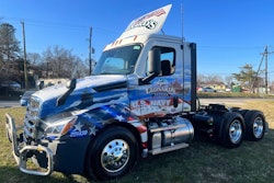 Truck with Navy-themed vinyl wrap