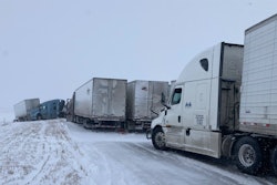 Trucks in accident on snow-covered interstate