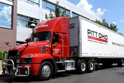 Tractor-trailer in front of office building