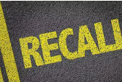 Recall painted on pavement