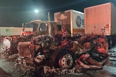 Remains of 2 trucks in Tennessee fire