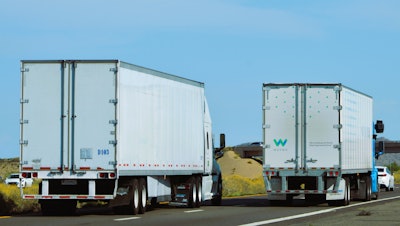 2 tractor-trailers on highway