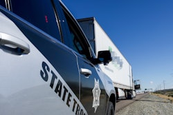 Arizona police car stopping a tractor-trailer