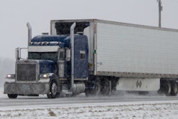 Tractor-trailer on snowy highway