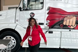 Angelique Temple in front of truck