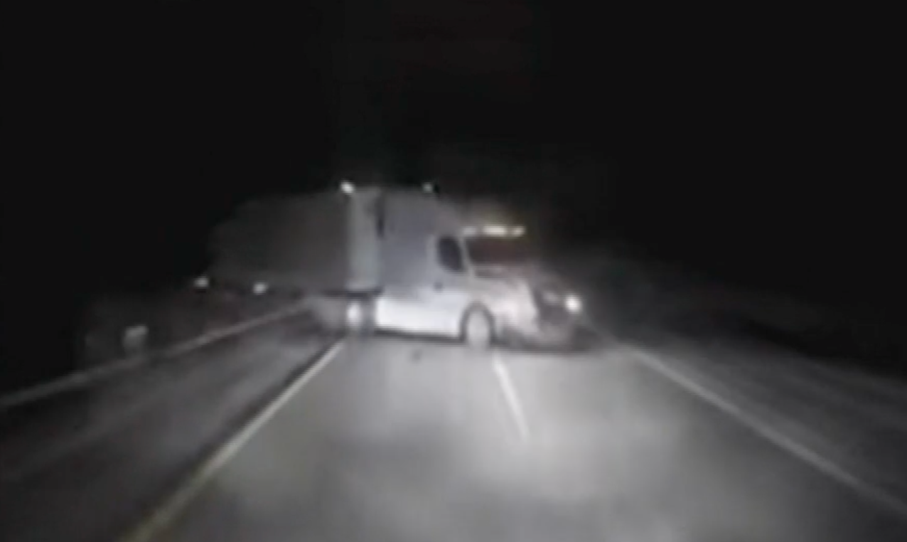 Tractor-trailer on I-80 at night