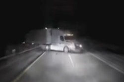 Tractor-trailer on I-80 at night