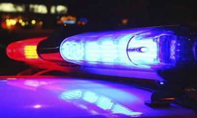 Red and blue lights on top of police car