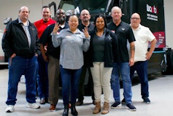 Truckers in front of truck