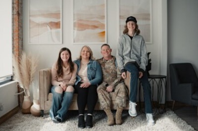 Military family sitting on a couch