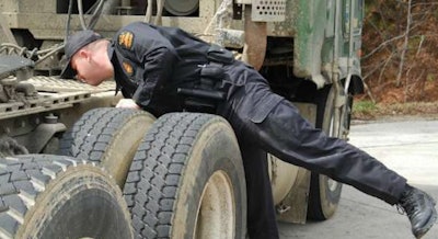 Inspector checking a truck