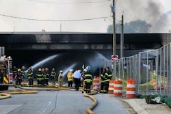 Firefighters at the scene of the I95 crash and fire in Philadelphia