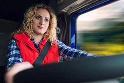 Woman driving big rig
