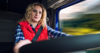 Woman driving big rig