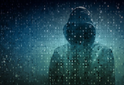 Dark hooded figure on a field of numbers