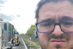 Trucker driver with fire trucks on I-64