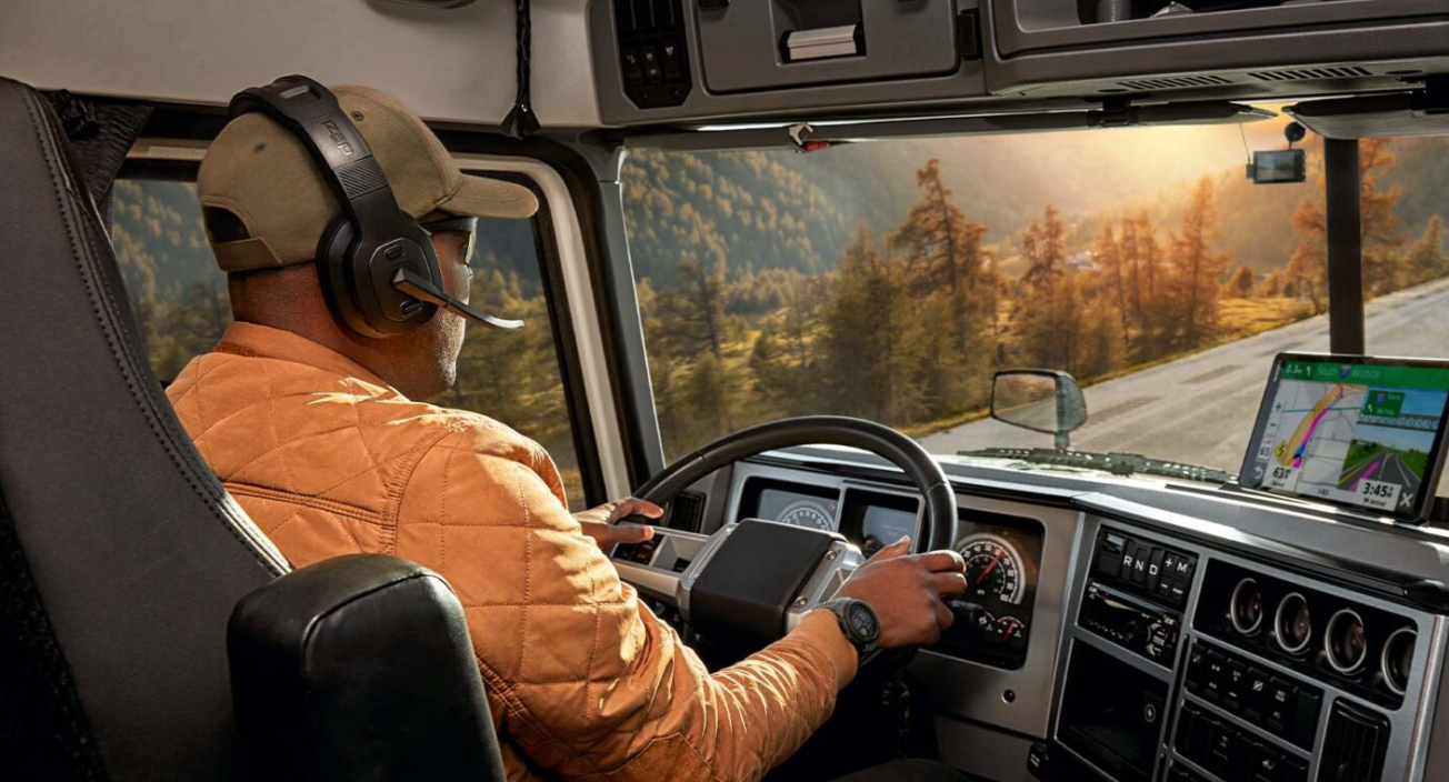 Truck driver on the highway with headset on