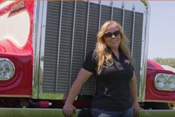 Kate Whiting in front of Cherry Pie, a 1973 Kenworth W900A
