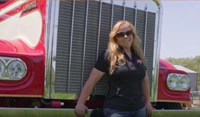 Kate Whiting in front of Cherry Pie, a 1973 Kenworth W900A