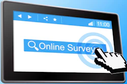 Digital hand on computer screen with 'Online Survey'on it