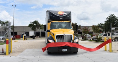 Estes truck 'cutting' the ribbon at the company's new terminal in New Orleans