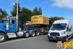 Tractor-trailer with heavy equipment stopped by police