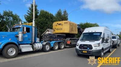 Tractor-trailer with heavy equipment stopped by police