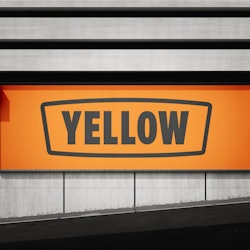 Yellow company logo sign