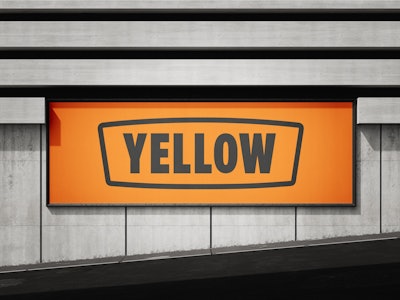 Yellow company logo sign