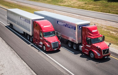 s Averitt Express trucks on the highway