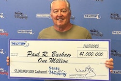 Paul Bashaw with his $1 million check