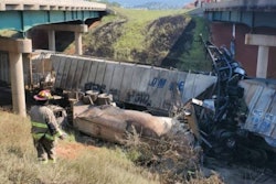 Tractor-trailer crashed into stopped freight train