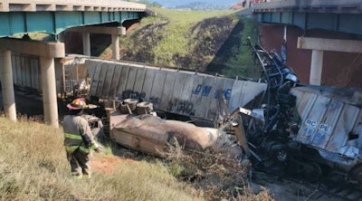 Tractor-trailer crashed into stopped freight train
