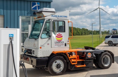 Orange EV e-TRIEVER heavy-duty yard truck