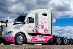 2024 Kenworth T680 with a pink and white wrap in honor of Breast Cancer Awareness month.
