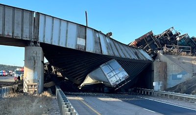 Train delrailment and collapses bridge on I-25