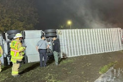 Overturned livestock hauler