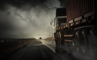 Tracor-trailer on the highway in a storm