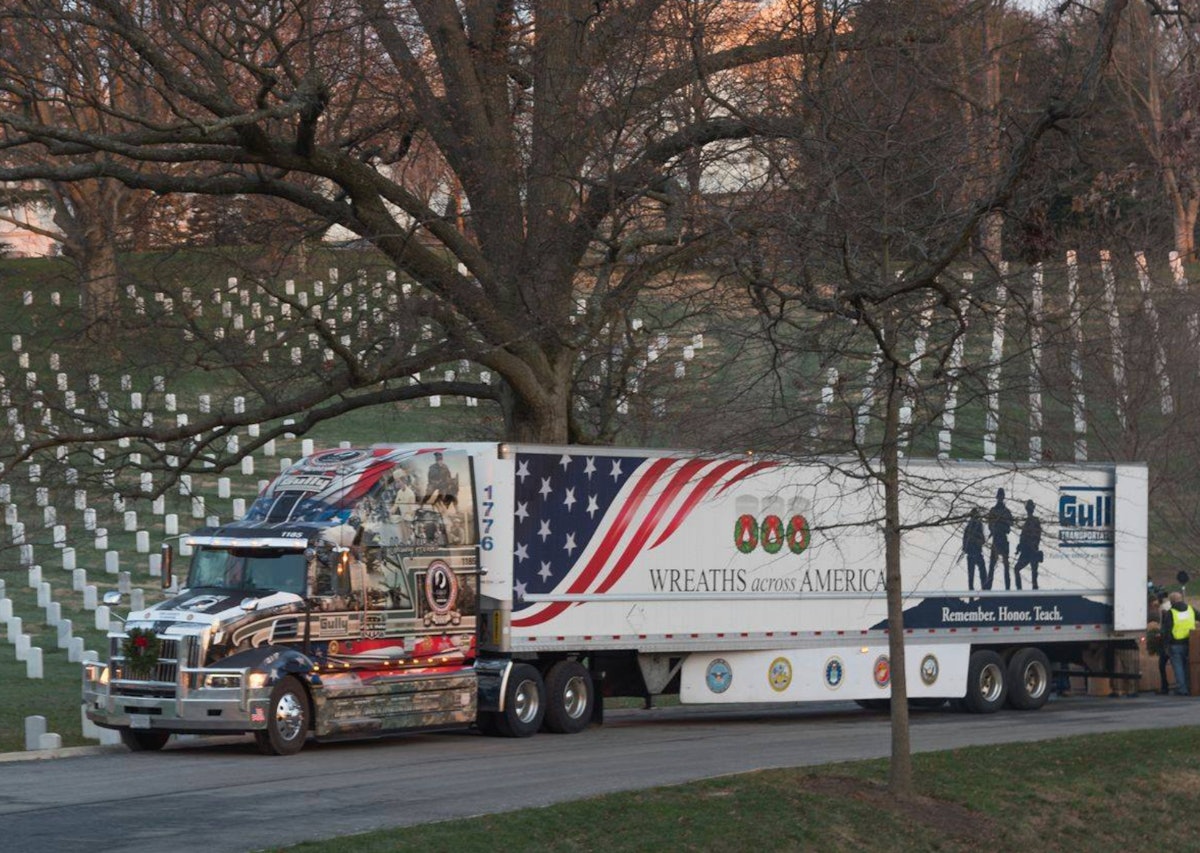 Numerous carriers part of delivery of wreaths to Arlington Cemetery