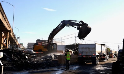 Crews removing debris at I-10 fire site